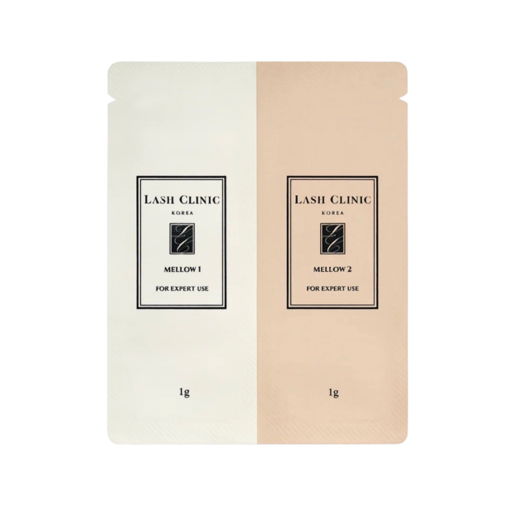 Two stand-up pouches of Lash Clinic KOREA Mellow 1 and Mellow 2 for expert use, shown side by side on a plain white background. The left pouch is a warm off-white/cream color labeled 'MELLOW 1', and the right pouch is a soft peach/beige color labeled 'MELLOW 2'.