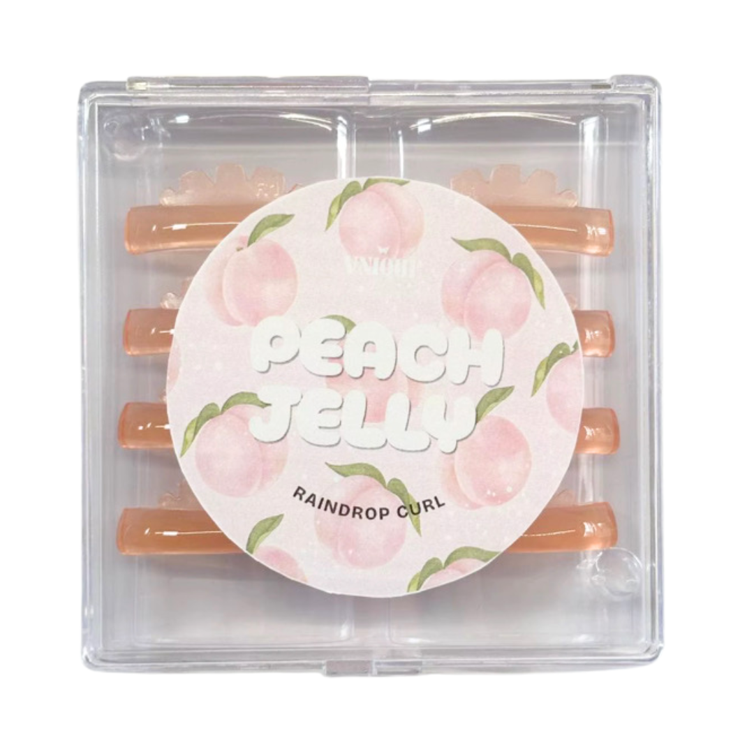 Raindrop Curl Peach Jelly hair curling wax in a clear square plastic case with a round pink label featuring peach illustrations and the text 'PEACH JELLY' and 'RAINDROP CURL'.