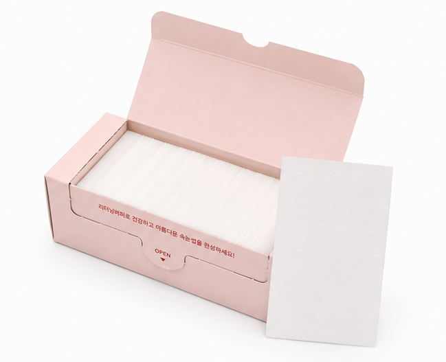 Four views of a light pink product box on a white background, showing the closed exterior, open exterior with white contents, open exterior with a separate insert, and the closed exterior from another angle. The box has red text reading 'Dreaming 1/2' and smaller Korean text.
