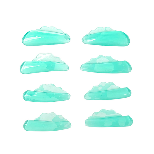 Six small translucent mint-green cloud-shaped accessories arranged in two columns on a plain white background.